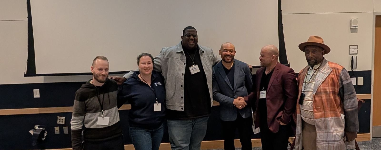 Conference panel handshake